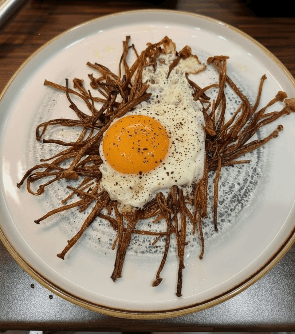 Crispy pan-fried Enoki mushrooms with fried egg